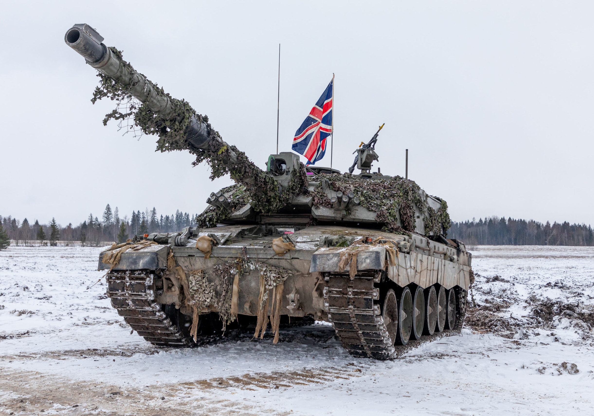 The Battlegroup forms up on the Runway, in Tapa Camp, for the start of the Brigade and Battlegroup integration phase of Exercise WINTER CAMP. This opportunity allows crews and commanders to conduct final checks before moving on to the area to establish positions.
 
Soldiers of NATOs multinational enhanced Forward Presence Battlegroup (eFP BG) are training with the 1st Estonian Infantry Brigade (1 EST Bde) during Estonias annual exercise WINTER CAMP. The two-week long exercise which started on the 28th of January 2023 demonstrates the combined arms capabilities of UK, French, Danish and Estonian forces.
 
For the past five months, the current rotation of the UK-led eFP BG has consisted of the British Armys Kings Royal Hussars (KRH) Tank Regiment, B Company of the Scots Guards, 127 Battery and 176 Battery of the Royal Artillery and 3 Armoured Engineer Squadron (3AES) deployed alongside the Armys Viking Squadron and the Les Verts Company of the French Armys Mountain Infantry Brigade.
 
The exercise also saw a further surge of troops including a company of Mountain Commandos and a platoon of Chemical Biological Radioactive and Nuclear (CBRN) specialists of the French Army DeTere, the RAFs Chinook Helicopters (CH47) of the Royal Air Forces Aviation Task Force and High Mobility Artillery Rocket System (HIMARS) of the US Armys 1st Infantry Division (1ID).